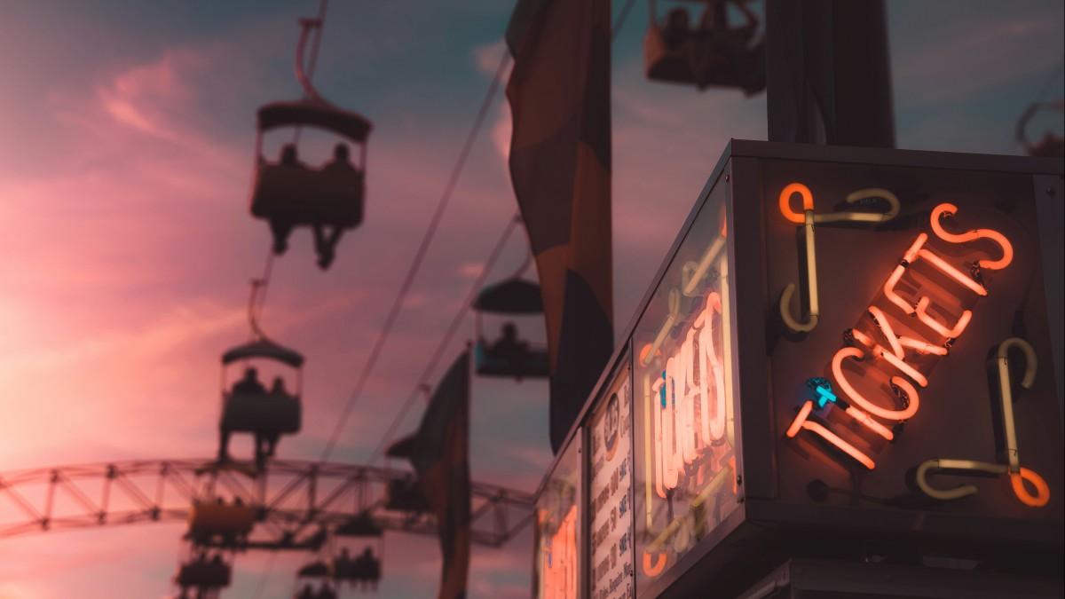 Een neon-bord met de tekst "Tickets"